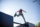 Parkour practice of a boy at sports ground in the morning